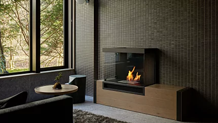 EcoSmart Fire XS340 Ethanol Burner recessed in brushed-chrome hearth adds bioethanol warmth to FUFU Kyu-Karuizawa lounge.